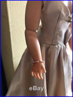 1956 Madame Alexander blonde Cissy doll in TLC Side Draped Satin Gown, flowers