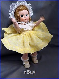Alexander-kins tagged 1953 in rare yellow star dress, lovely