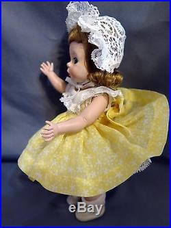 Alexander-kins tagged 1953 in rare yellow star dress, lovely