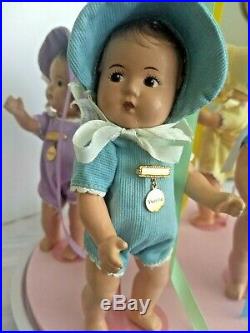Dionne Quintuplets dolls 1930s marked Madame Alexander with May Pole