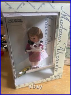 Madam alexanders doll lot 34315, 33845, 27805 And Lady With Alligator Purse