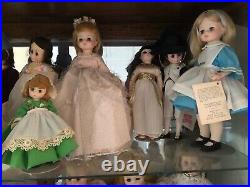Madame Alexander Doll Collection with oak/etched glass curio cabinet. 44 dolls