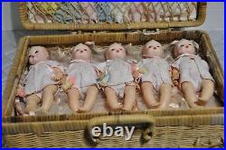 Madame Alexander Fisher Quintuplets Dolls come in a basket case with clothes