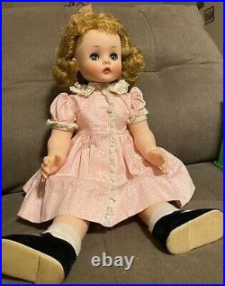 Vintage 1950's Madame Alexander Kelly 19 Doll with check dress and Pink Bow