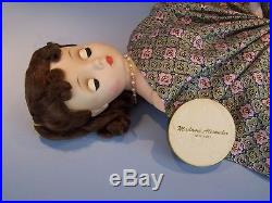 Vintage 1950s Madame Alexander Cissy Doll wearing rare FAO Schwartz dress