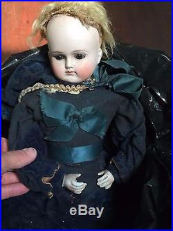 Vintage Doll in poor condition looks like sawdust for stuffing look at pics